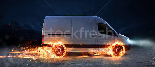 Super fast delivery of package service with van with wheels on fire Stock photo © alphaspirit