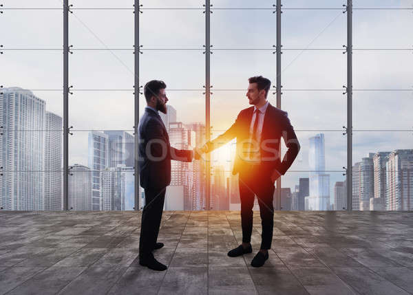 Business handshake. Concept of teamwork and partnership Stock photo © alphaspirit
