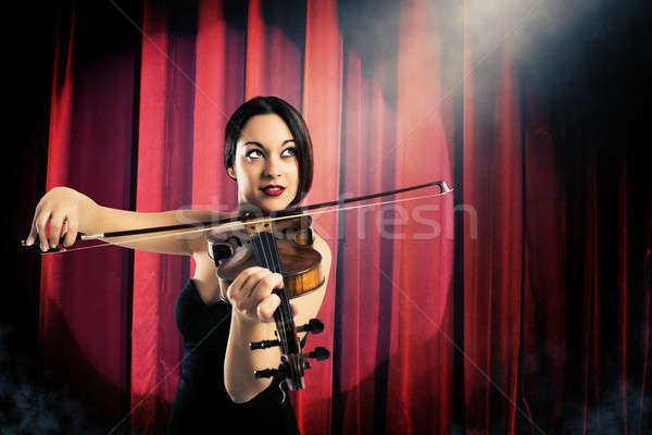Charming violinist Stock photo © alphaspirit