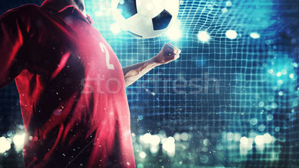 Striker player controls the ball near the football goal Stock photo © alphaspirit