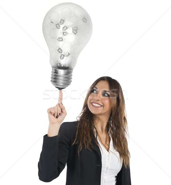 üzletasszony ötletelés mosolyog nagy villanykörte nő Stock fotó © alphaspirit