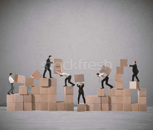 Team of businesspeople build a new company Stock photo © alphaspirit