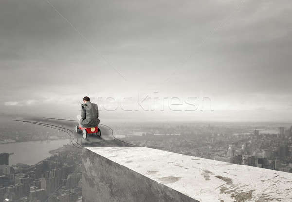 Businessman driving a car. Limitless concept Stock photo © alphaspirit