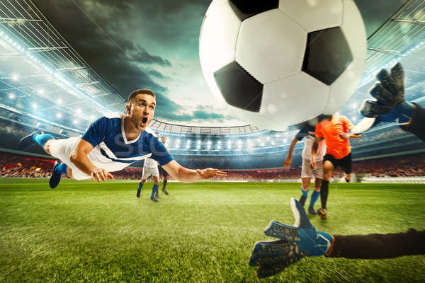 Football scene with competing football players at the stadium. 3D Rendering Stock photo © alphaspirit