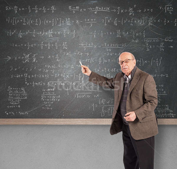 Stock photo: Elderly math teacher