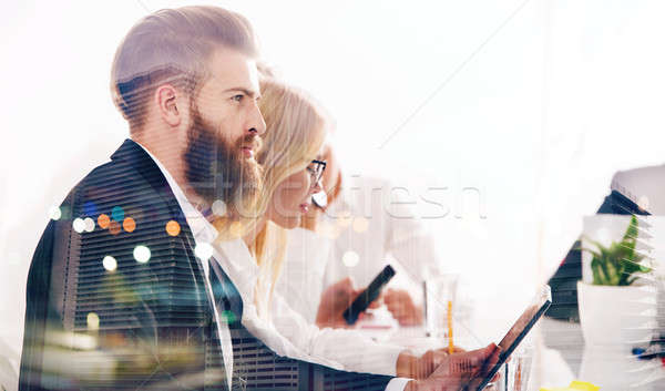 Businessman in office connected to internet network. concept of startup company. double exposure Stock photo © alphaspirit