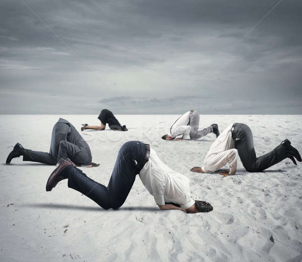 Fear of crisis with businesspeople like an ostrich Stock photo © alphaspirit