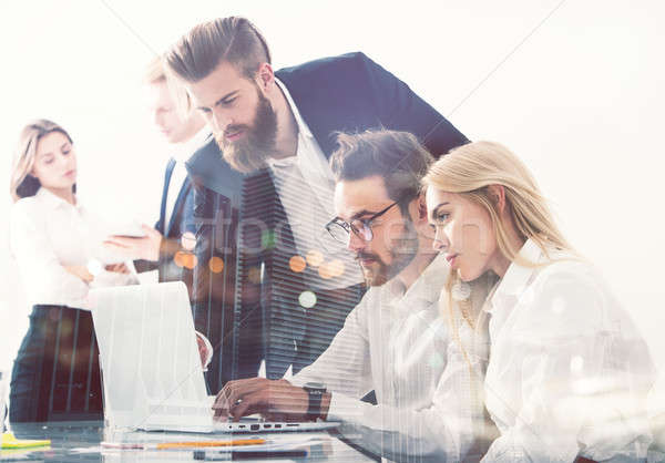 Businessman in office connected on internet network. concept of startup company. double exposure Stock photo © alphaspirit