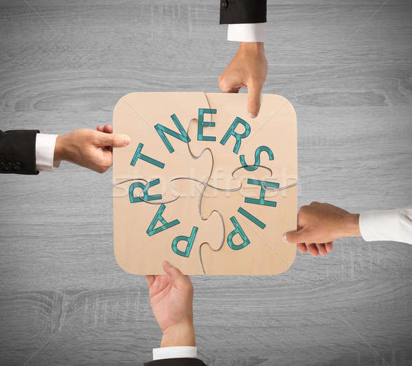 Business partnership puzzle Stock photo © alphaspirit