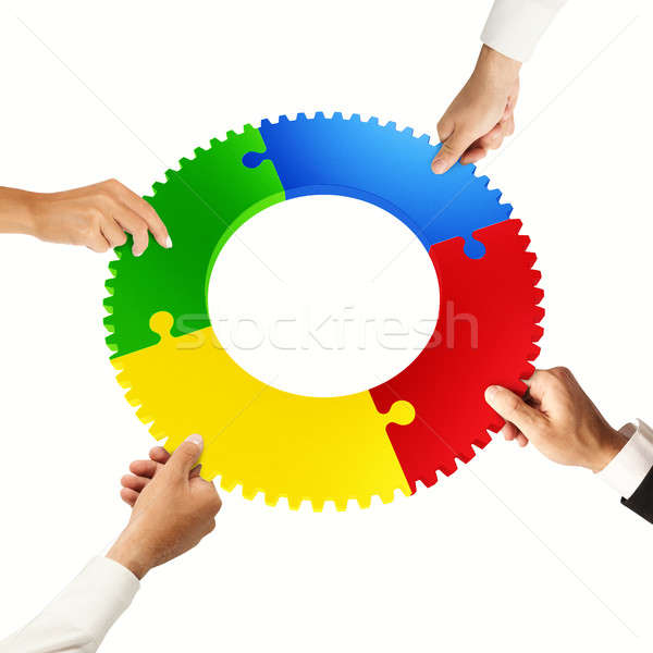 Teamwork and integration concept with puzzle pieces Stock photo © alphaspirit