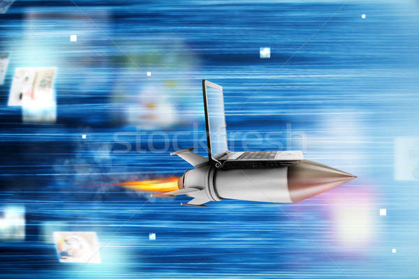 Fast internet concept with a laptop over a rocket Stock photo © alphaspirit