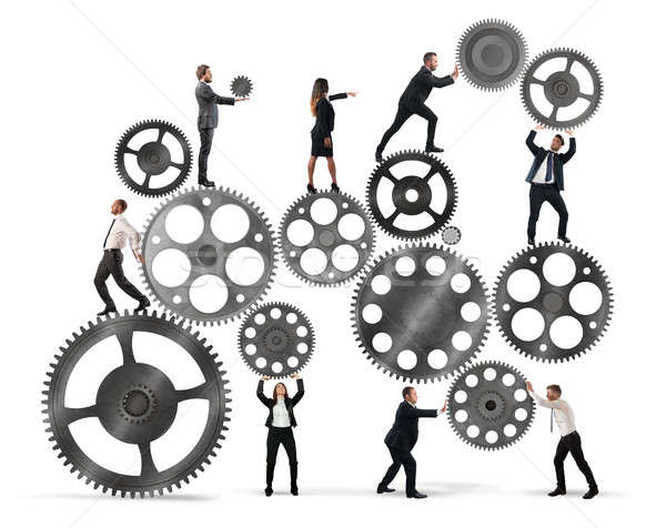 Teamwork of businesspeople Stock photo © alphaspirit