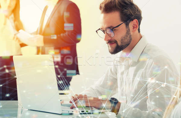 Businessman in office connected on internet network. concept of startup company Stock photo © alphaspirit