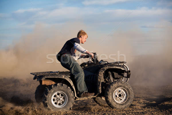 teen riding ATV quad Stock photo © alptraum