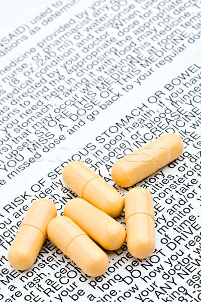 pills with warning label Stock photo © alptraum