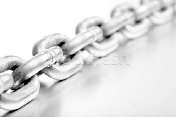 heavy chain on brushed metal Stock photo © alptraum