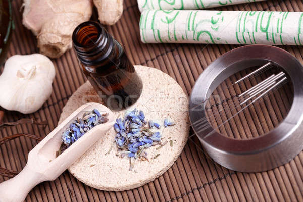 Akupunktúra tűk gyógynövények fektet kő fából készült Stock fotó © Amaviael