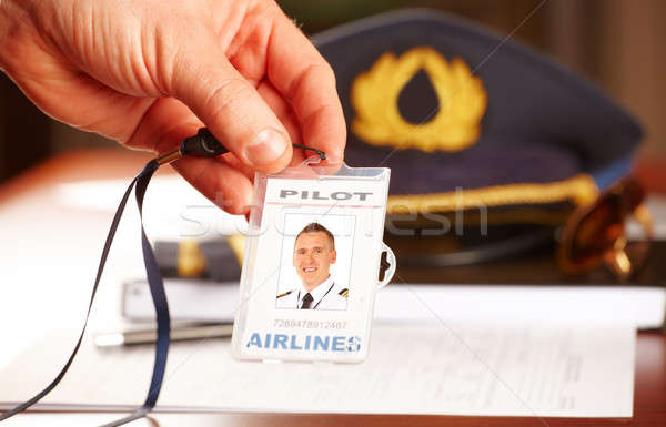 Profi légitársaság pilóta felszerlés kéz személyi igazolvány Stock fotó © Amaviael