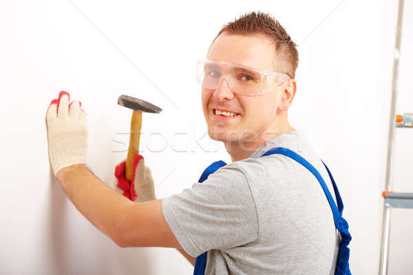 Man working with hammer Stock photo © Amaviael