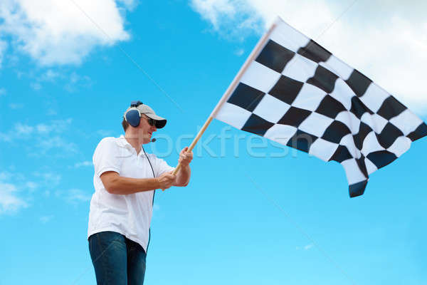 Man waving a checkered flag on a raceway Stock photo © Amaviael
