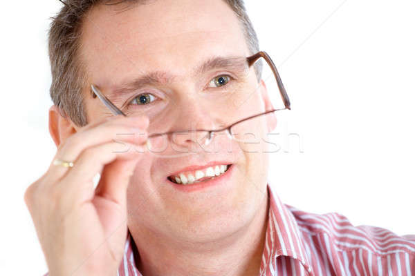 Man taking off glasses Stock photo © Amaviael