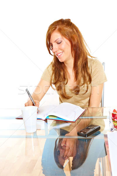 Diák lány notebook mosolyog tanul asztal Stock fotó © Amaviael