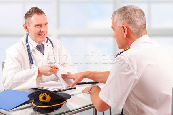 Vizsga repülőgép pilóta orvosi vizsgálat orvos bemutat Stock fotó © Amaviael