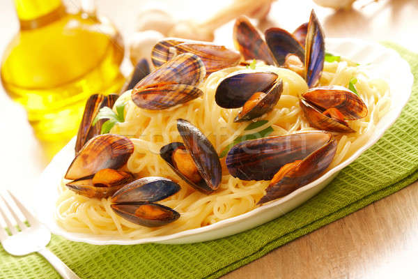 Spaghetti and mussels Stock photo © Amaviael