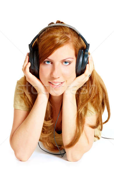 Lány fejhallgató fektet izolált fehér nő Stock fotó © Amaviael