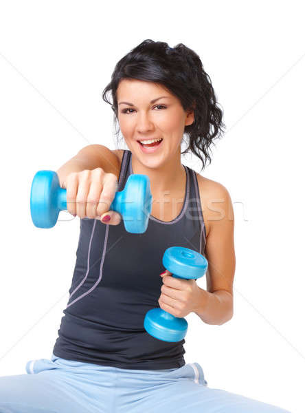 Stock photo: Young woman with dumbbell