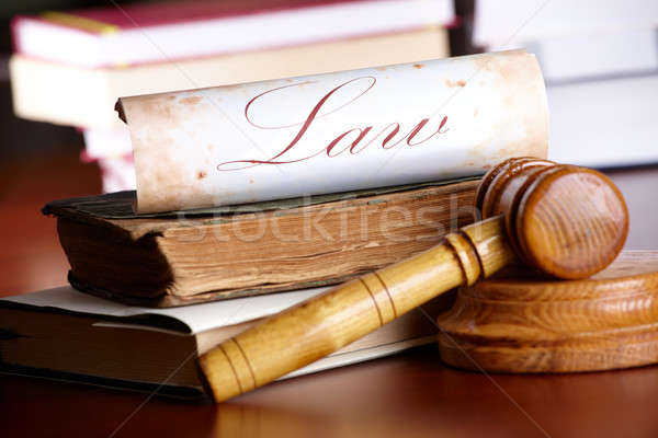 Judges gavel with very old books Stock photo © Amaviael