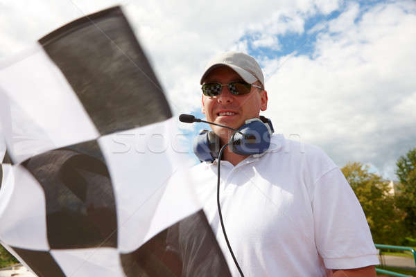 Flagman with checkered flag Stock photo © Amaviael