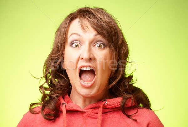 Screaming shocked woman Stock photo © Amaviael