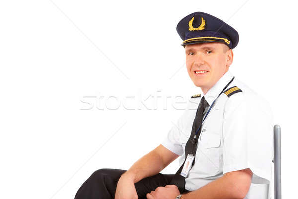 Légitársaság pilóta ül derűs visel egyenruha Stock fotó © Amaviael