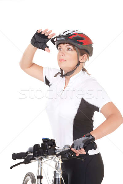 Lány kerékpáros fiatal nő motoros bicikli néz Stock fotó © Amaviael