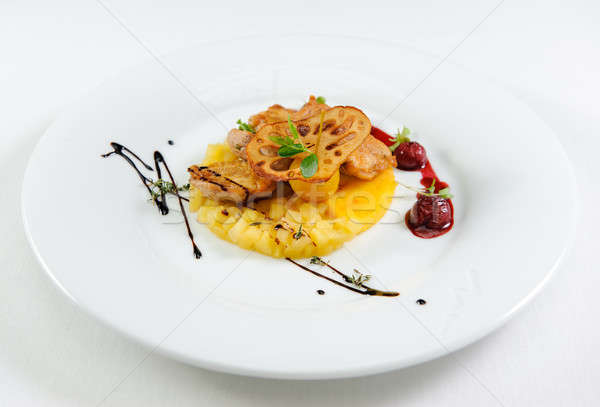 Quail breast with polenta, apple chutney and cherry-cognac sauce Stock photo © amok