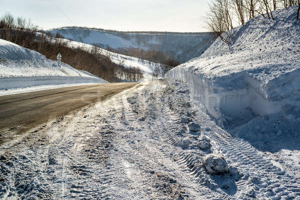 Snowdrifts and rural road. Petropavlovsk-Kamchatsky in march Stock photo © amok