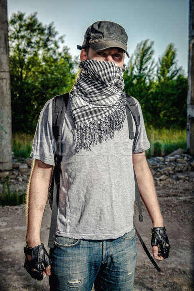 Uomo faccia sciarpa terrorismo guerra jeans Foto d'archivio © amok