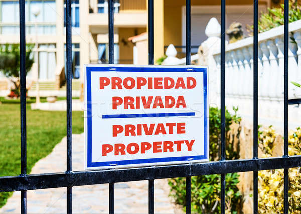 Stock photo: Private property sign on a iron gate