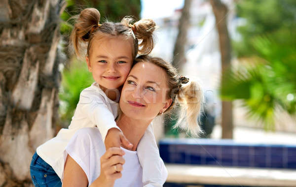 Beautiful mother and daughter outdoors Stock photo © amok
