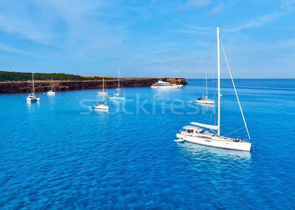 Early morning in in Formentera. Sailboats at Cala Saona bay Stock photo © amok