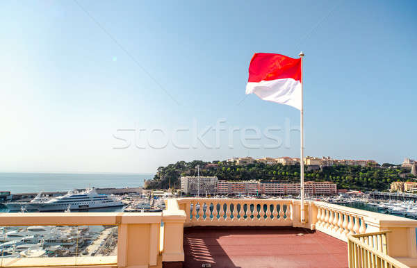 National flag of of the Principality of Monaco and view of port Stock photo © amok