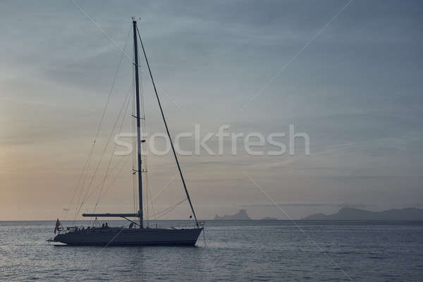 Yacht at Cala Saona in Formentera at sunset. Spain Stock photo © amok