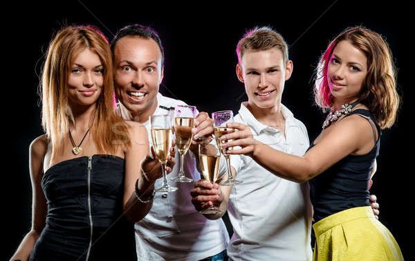 Groupe jeunes verres champagne [[stock_photo]] © amok