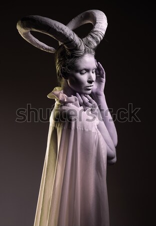 Female with goat body-art isolated on white. Stock photo © amok