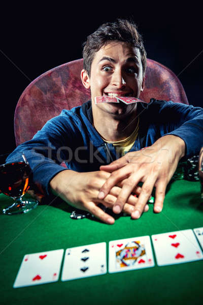 Сток-фото: покер · игрок · счастливым · казино · молодые · успех