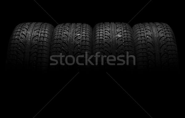 Car tires over black background Stock photo © amok