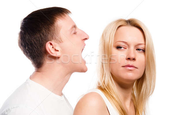 Man screaming at his girlfriend over white background Stock photo © amok
