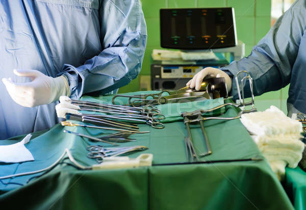 Surgeons and surgical tools Stock photo © amok