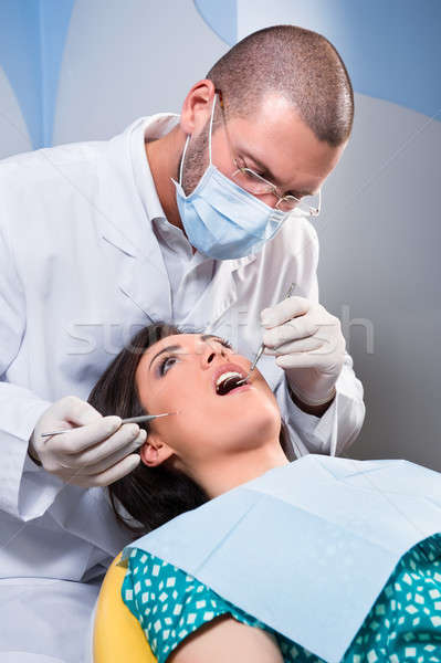 Homme patient dents spécialiste femme bureau [[stock_photo]] © amok